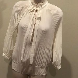 Ivory button don bodysuit. Brand new size medium